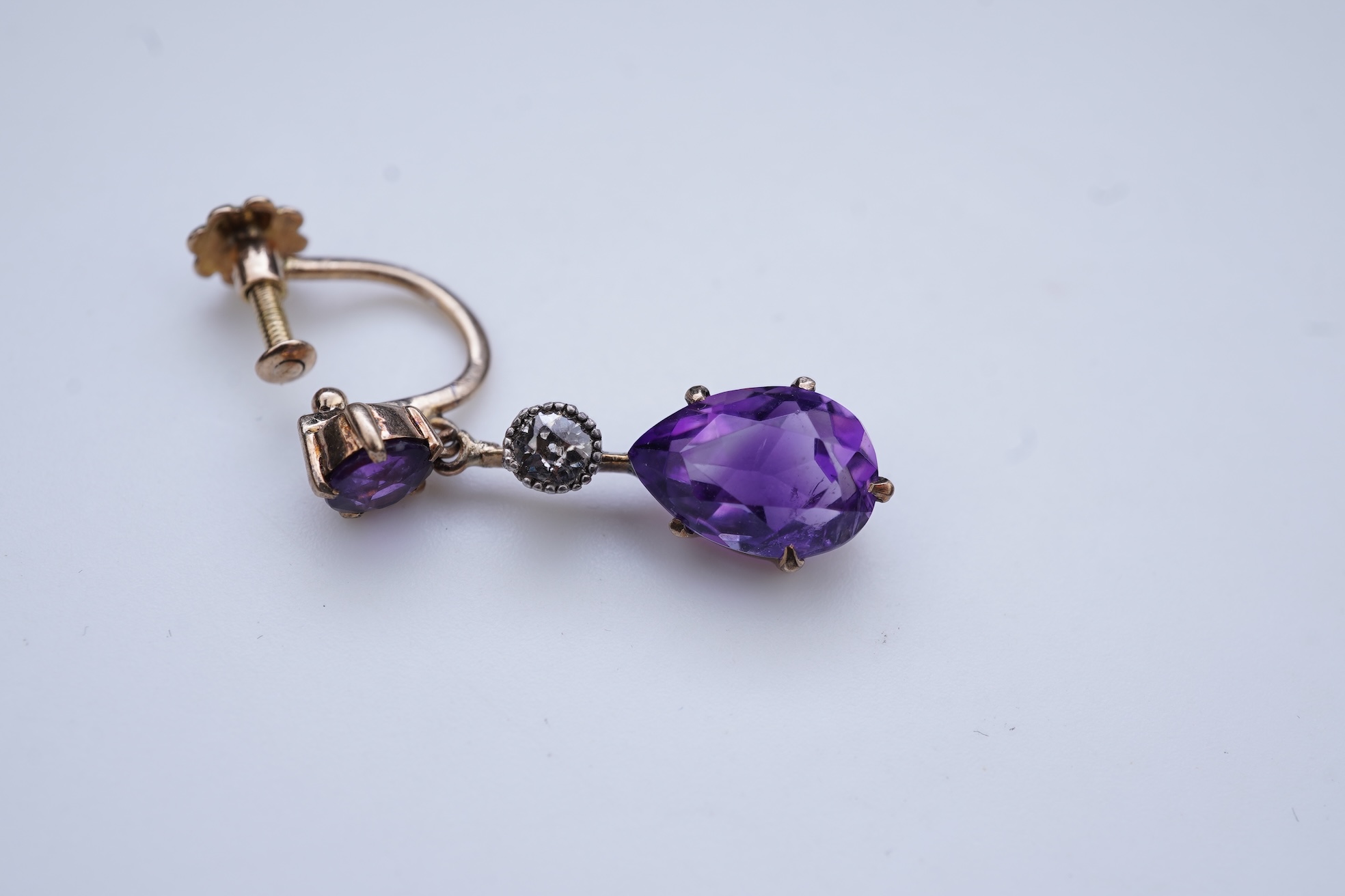 A pair of amethyst and diamond earrings, early 20th century